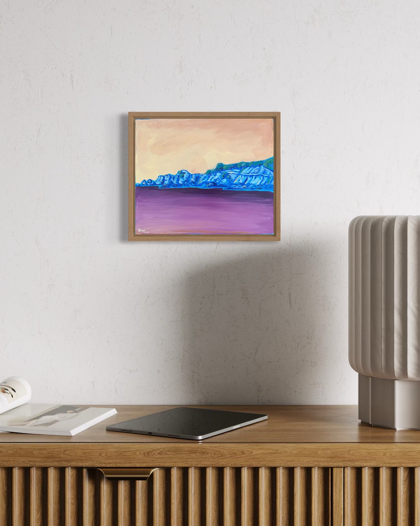 Anglesea - Point Roadknight in Blue artwork framed in raw oak, mixed media on board created by artist Lauren Danger. Artwork displayed on a white wall above an oak sideboard in a living room.