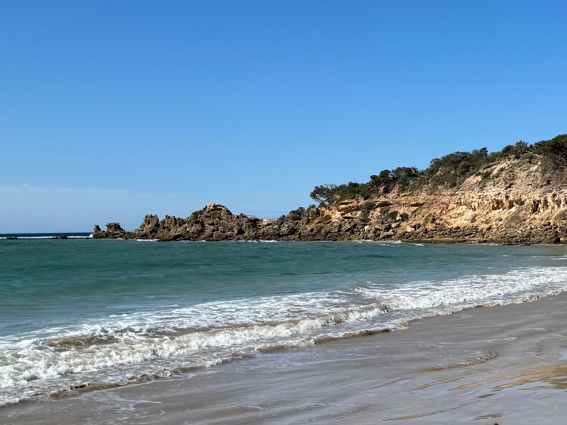 Photo of Anglesea-Point Roadknight in Blue, used as a reference image.  Photois a close up of the rocks in Point Roadknight with a blue sky above and ocean below